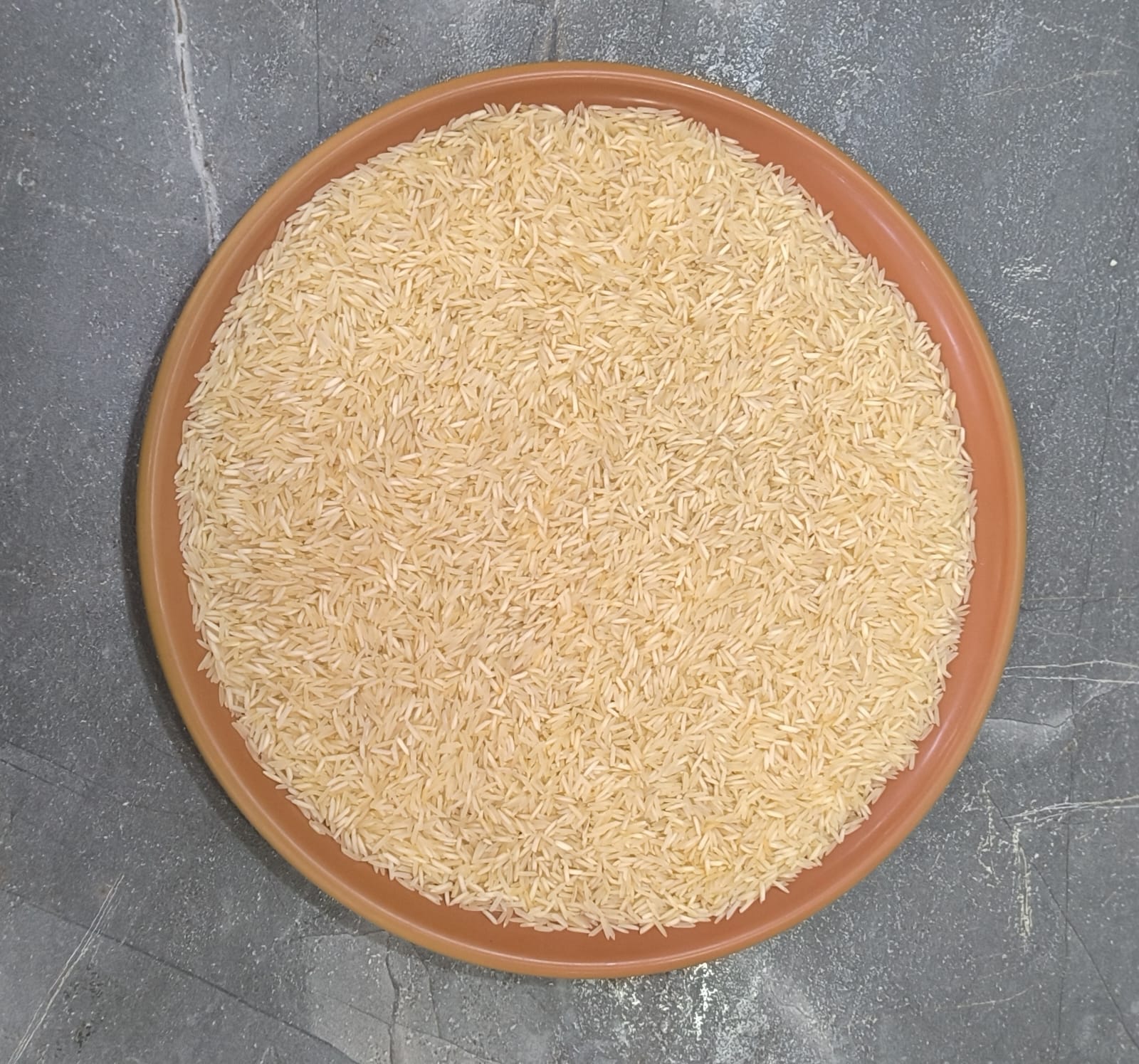 Rice, dals, dry fruits and spices on a grocery counter
